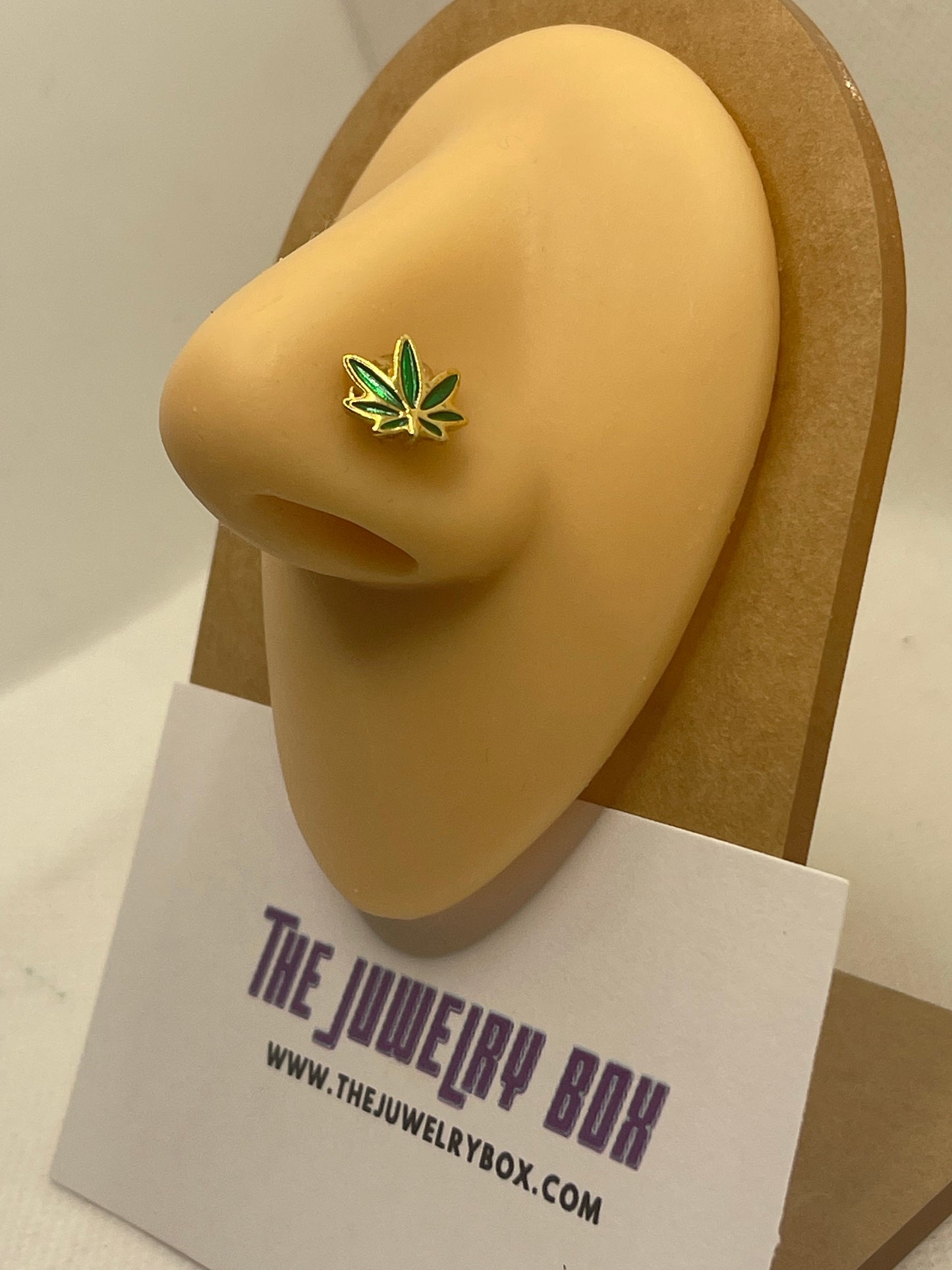 green marijuana leaf nose stud 